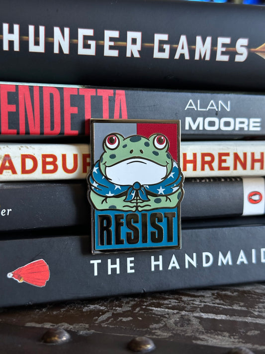 Resist Frog Pin - Grey/Red/Blue Background